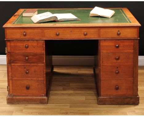 A Victorian oak partner's desk, by W &amp; C Wilkinson, 14 Ludgate Hill and numbered 8609, rectangular top with inset writing