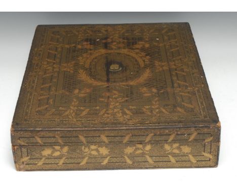 A Chinese export lacquer rectangular games box, decorated in gilt with leaves and bands of motifs, the cover centred by an ar