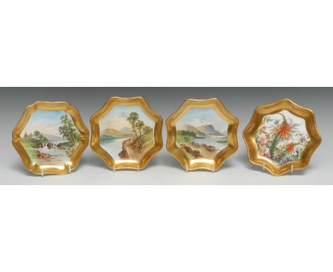 A set of three Coalport topographical shaped dishes, colourfully painted with Highland landscapes, solid gold banded borders,