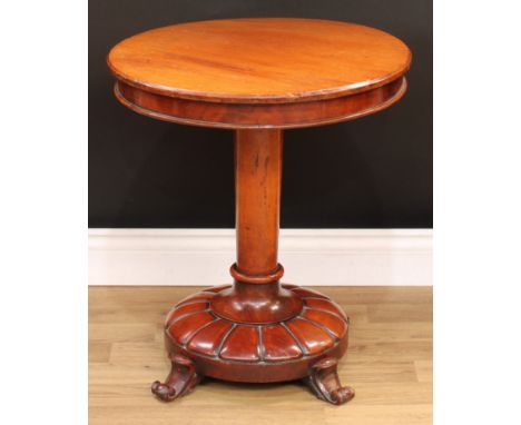 A William IV mahogany pedestal wine table, circular top, tapered cylindrical pillar, fluted circular base, scroll feet, 59.5c