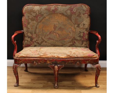 A George I Revival Japanned sofa, cartouche shaped back, drop-in tapestry upholstery, decorated overall in the Chinoserie tas