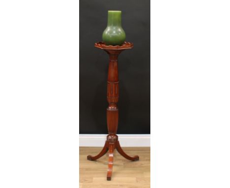 An Edwardian mahogany tripod statuary pedestal, in the George III taste, octagonal top with wavy gallery, panelled baluster p