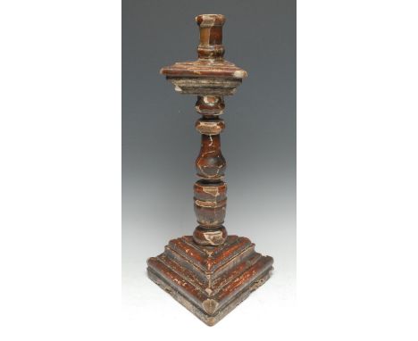 A 17th century  North European softwood and gesso triform candlestick, turned pillar, 46cm high, c.1670 