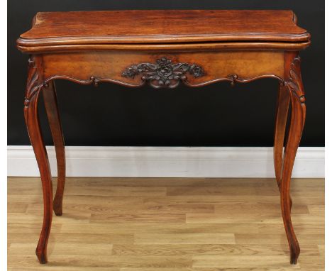 A Victorian walnut serpentine card table, in the French taste, folding top enclosing an inset baize lined playing surface, ab