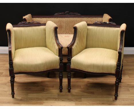 A French Hepplewhite Revival three piece drawing room suite, comprising sofa and a pair of armchairs, each with a ribbon cres