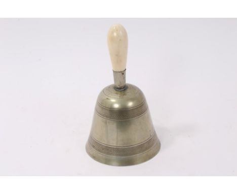 19th century white metal table bell with ivory handle and engine-turned ornament, 20cm high