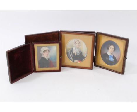 Three 19th century portrait miniatures on ivory, each depicting seated lady, the largest oval, 10 x 8cm, glazed folding cases