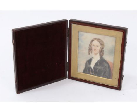 English School, circa 1820, miniature portrait on ivory of a lady with black dress and ringlets, 8 x 7cm, glazed folding leat