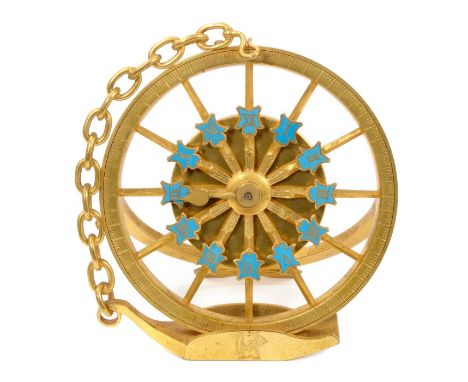 19th century travelling clock with watch movement in the form of a gilt metal carriage wheel, with graduated minute scale and