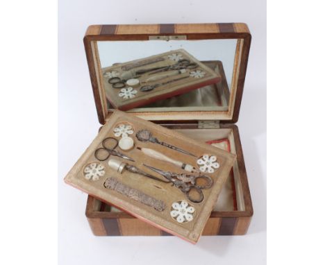 19th century Continental satinwood and banded sewing box, the hinged cover with mirror to underside and enclosing fitted fabr