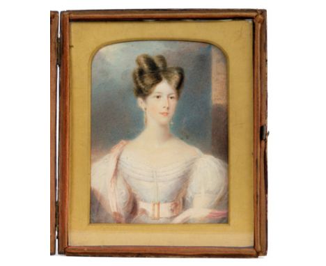 English School, circa 1840, miniature portrait on ivory of a lady, possibly an actress, pictured half-length seated before a 