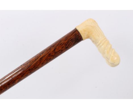 Victorian erotic novelty walking stick with carved ivory phallus handle and partridge wood shaft - with original velvet handl