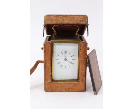 Mid-19th century carriage clock with eight day timepiece movement and lever escapement, white enamel dial with Roman numerals