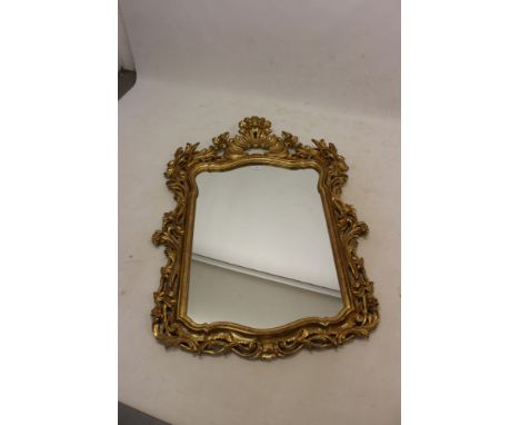 18th century-style rococo giltwood and gesso wall mirror, 140cm high.