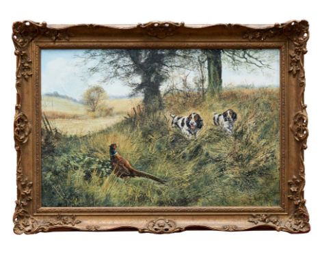 *Henry Wilkinson (1921-2011) oil on canvas - Spaniels and a Cock Pheasant, signed, in gilt frame, 50cm x 70cm.