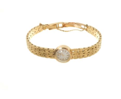 Ladies’ Jaeger-LeCoultre 18ct gold bracelet watch with circular dial on integral plated gold bracelet. Case 13.5mm diameter, 