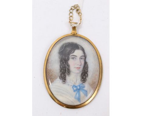 English School, mid-19th century portrait miniature on ivory of a lady wearing white dress and blue bow, oval, 6 x 4cm, glaze