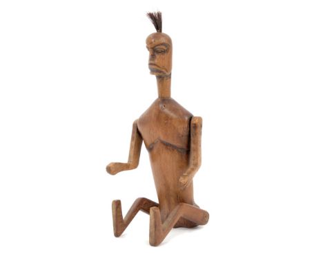 Rare antique tribal articulated wooden puppet figure, with stylised features and articulated limbs and neck, relief carved fi