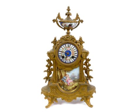 19th century mantel clock with eight day French movement striking on a bell and floral painted porcelain dial with Roman nume