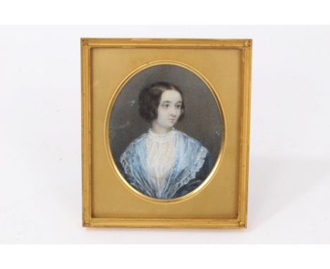 English School, mid-19th century portrait miniature on ivory of a lady with blue lace dress, oval, 8 x 6.5cm, glazed gilt fra