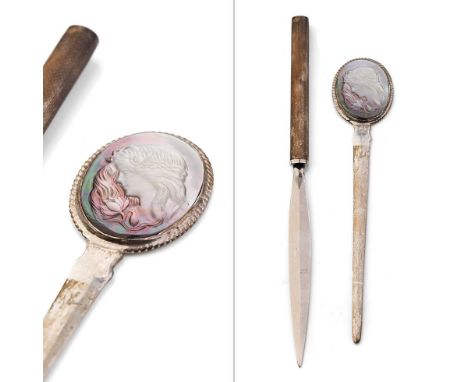 Sterling silver letter opener with carved abalone inset together with a similar silver handled item with engine turned decora