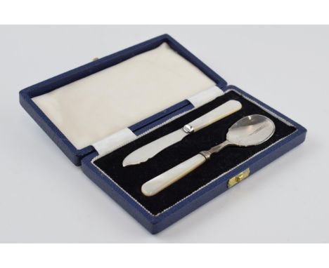 Cased silver small pair to include spoon and knife with Mother of Pearl handles, Sheffield 1957/1958.  