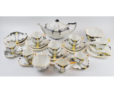 A collection of Shelley tea ware to include 11479 Sunset and Trees teapot (cracked), a quantity of 11678 Sunset and Trees duo