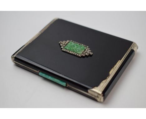 Asprey &amp; Co: a silver gilt cigarette case with enamelled decoration set with Jade inserts, 8.5cm wide, with original purc