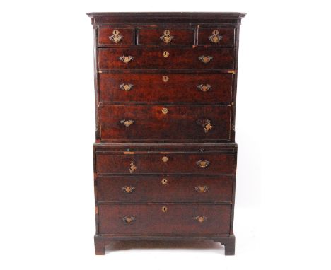 A George III mahogany chest-on-chest, the upper section having a moulded cornice above three short over three long graduated 