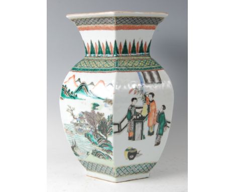 A 19th century Chinese famille verte vase, of hexagonal baluster form, enamel decorated with figure landscape scenes and exot