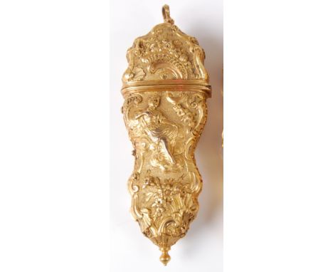 A George III gilt metal etui, worked in high relief with a figure to either side, within C-scrolls, leaves, flowers and folia