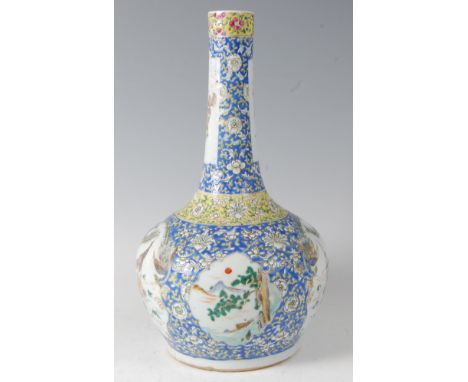 A 19th century Chinese bottle vase, enamel decorated with figure landscape reserves within a blue border of flowers and folia