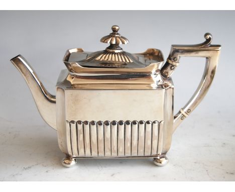 A late Victorian silver bachelors teapot, of half-reeded rectangular form, raised on bun feet, 9.3oz, maker Henry Stratford L