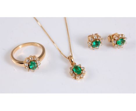 An 18ct emerald and diamond suite, comprising of a ring, necklace and matching earstuds, each as a single oval cut emerald su