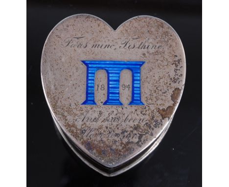 A Victorian silver heart shaped box, the removable cover blue enamel decorated with a viaduct and dated 1894, inscribed 'Twas