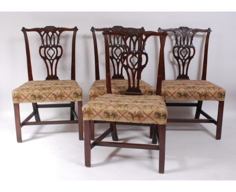 A good set of four early George III mahogany dining chairs, in the Chippendale taste, having shaped acanthus leaf carved cres