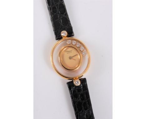 A lady's Chopard Happy Diamonds quartz wristwatch, the oval signed dial with rubover mount, glass surround inset with five ro