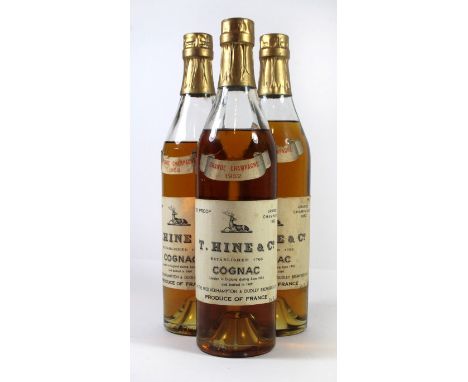 3 bottles T Hine &amp; Co ‘Grande Champagne’  Vintage Cognac 1952 
Landed 1953, bottled 1969 by Wolverhampton &amp; Dudley Br