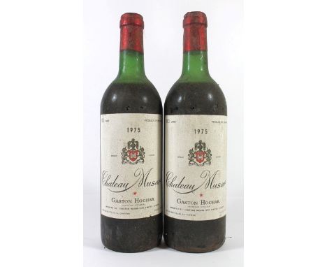 2 bottles Chateau Musar 1975 
(2 mus) good condition, fully intact slightly cellar soiled labels, ullage level consistent wit