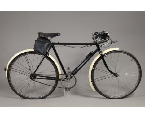 A vintage Raleigh sports model gent’s bicycle (black), together with a vintage Sun Beam ditto, each with a leather saddle.