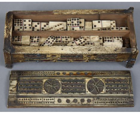 NAPOLEONIC PRISONER OF WAR – a carved &amp; inlaid-bone wooden domino box containing a set of thirty-eight miniature dominoes