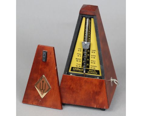 A Wittner Maelzel metronome in a mahogany-finish case, 22cm high.