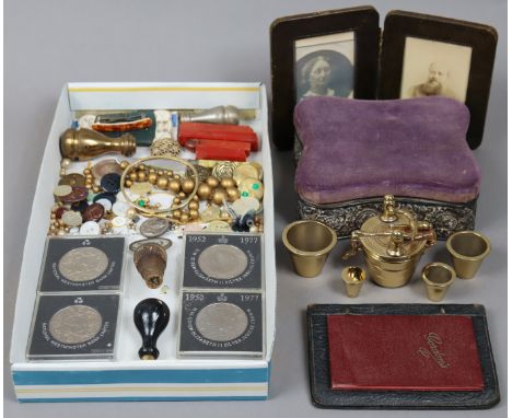 An Edwardian silver-embossed rectangular trinket box with a padded lift-lid, Birmingham 1905; together with a set of brass bu