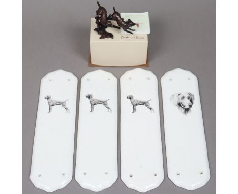 A Butler &amp; Peach small, bronzed model “Two Labradors Running” (No. 2021), 7.5cm wide, boxed; &amp; a set of four ceramic 