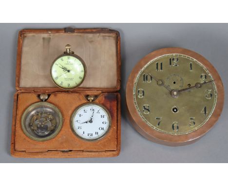 An Omega brass-mounted spherical glass paperweight timepiece, 6cm diameter; together with a travelling timepiece in a leather