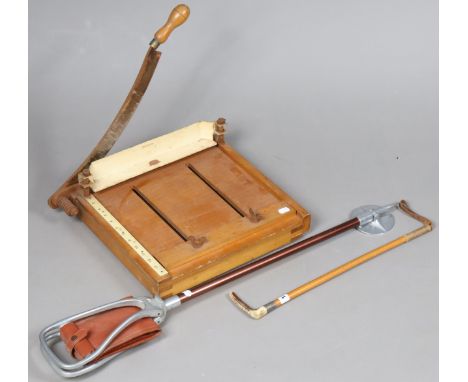 A horn-handled riding crop with a silver collar, 58cm high; together with a Game Bird shooting stick; &amp; a vintage Veteran