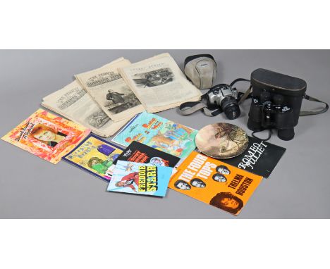 A pair of Super Zenith 10 x 50mm field glasses; together with a Canon “EOS 1X7” camera, both cased; various theatre programme