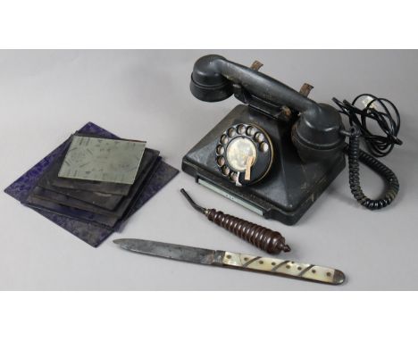 A vintage black Bakelite pyramid telephone; together with eleven Victorian coloured glass door panes, part w.a.f.; a large po