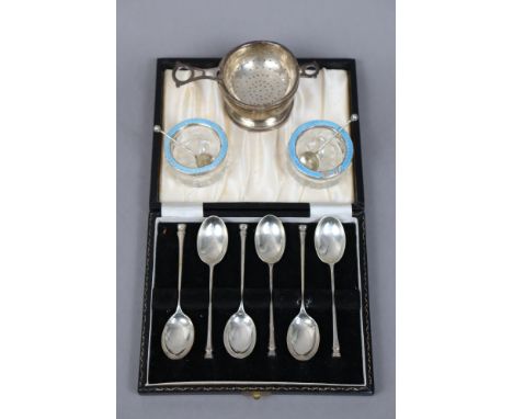 A set of six modern silver coffee spoons, cased; a George VI silver tea-strainer &amp; bowl, Birmingham 1947; &amp; a pair of