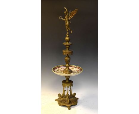 Reproduction brass and ceramic table centre with winged figure, 77cm high  